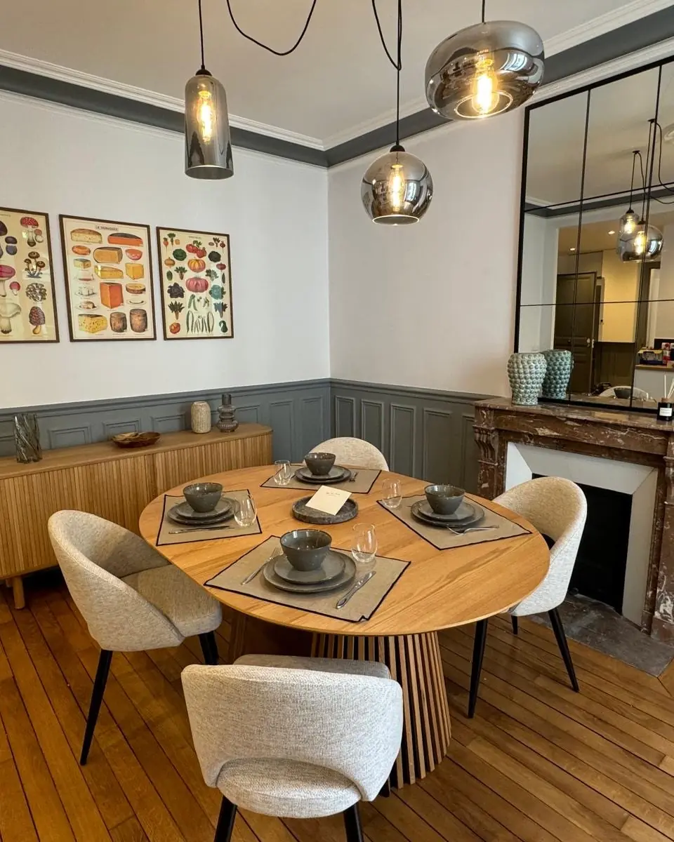 Salle à manger d'un appartement parisien rénové, photo de Travaux Privés